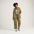 Full body front view of model wearing 100% organic cotton camp shirt in color bay.