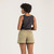 Close up back view of model wearing 100% organic cotton camp shorts in color bay.