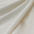 Close up photo of 100% regenerative organic certified cotton classic tank fabric.