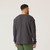 Close up back view of model wearing organic cotton waffle henley in color pepper.