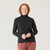 Close up front view of model wearing organic cotton turtleneck in color pepper.