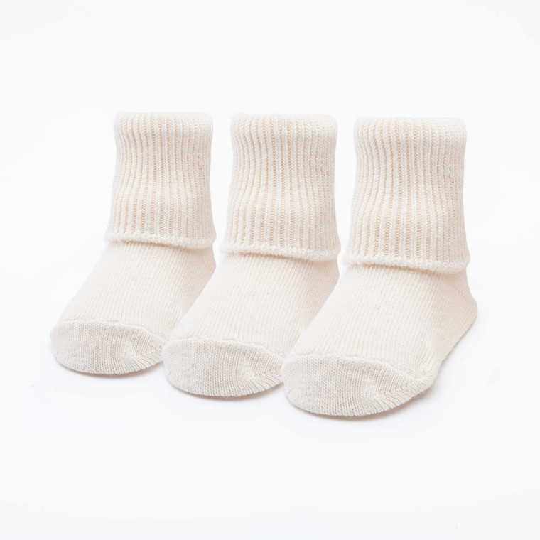 Natural white solid color organic cotton baby anklet socks. Pack of three.