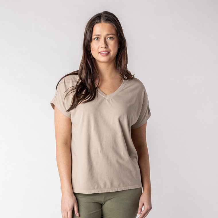 Front view of model wearing organic cotton slouch tee in putty.
