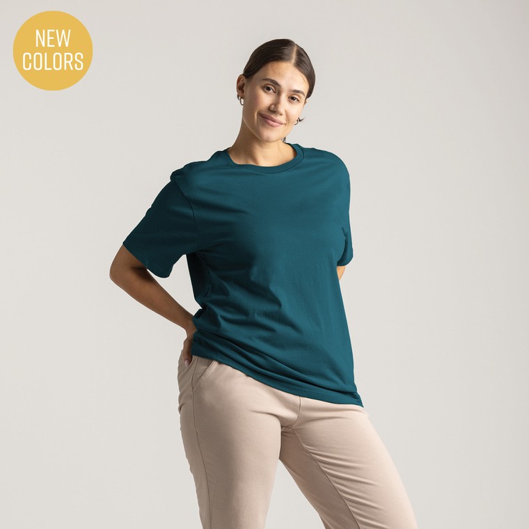 Front view of model wearing 100% Regenerative Organic Certified® Cotton - Classic Crew Neck Tee in teal.