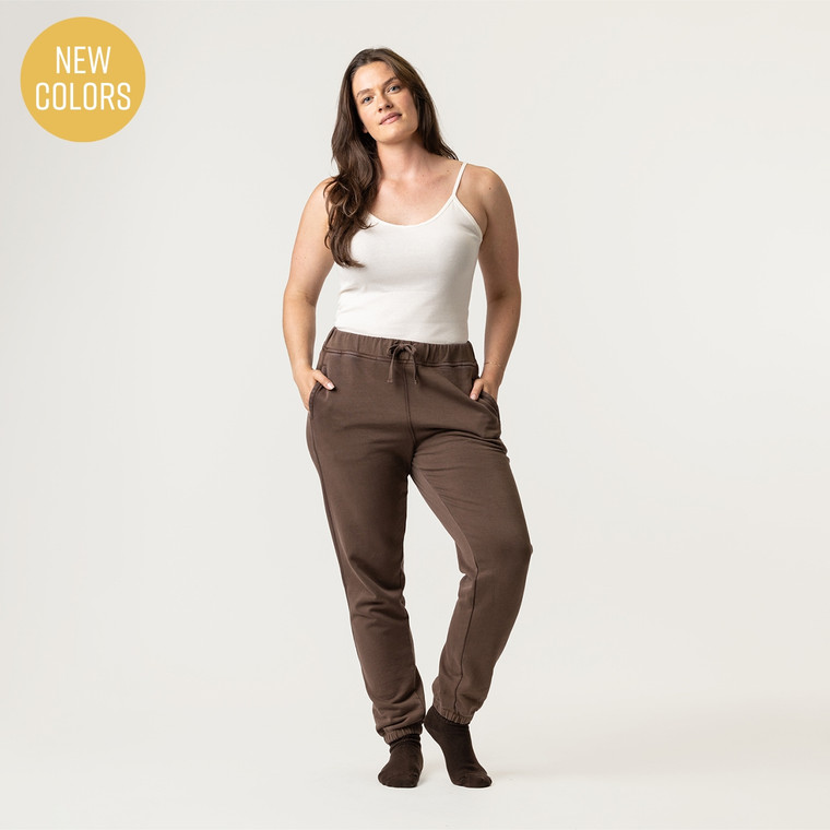 Full body view of model wearing organic cotton classic sweat pant in chocolate