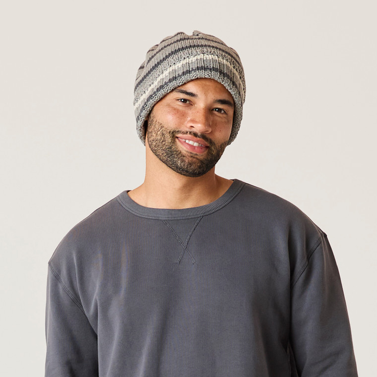 Close up of model wearing organic cotton chunky beanie in color heather grey stripe.